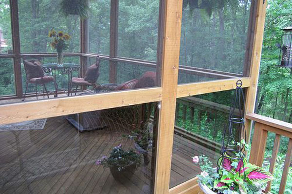 VERANDA IN POLICARBONATO COMPATTO FUME’ CON TELAIO IN LEGNO CHIARO